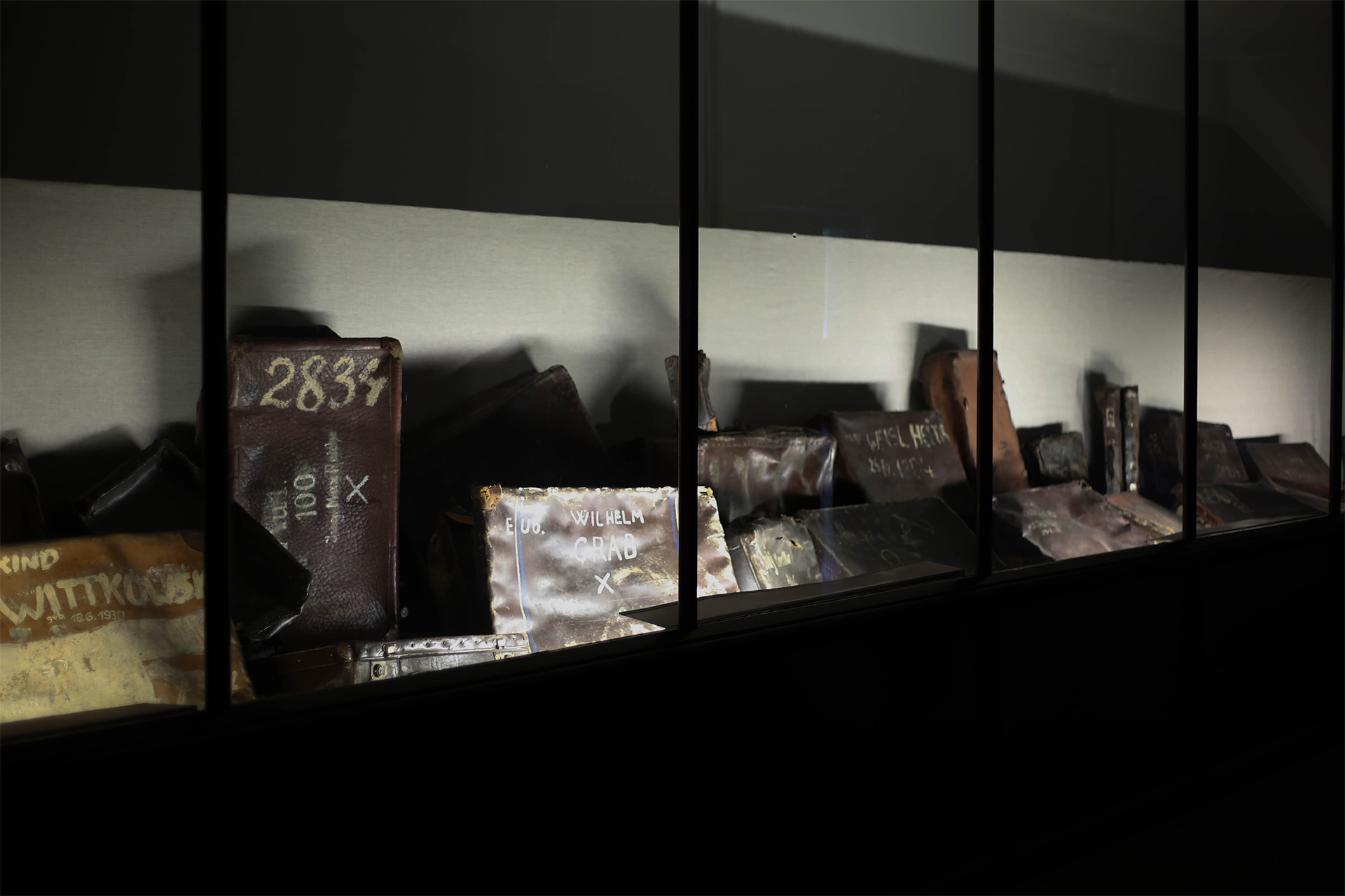 Corridor of prisoner photographs in Auschwitz I